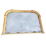 A painted Victorian overmantle mirror, the arched rectangular frame with twisted style moulding