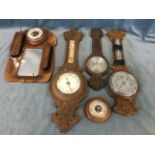 Five aneroid barometers ripe for restoration with circular dials - Victorian oak cased with Graham &