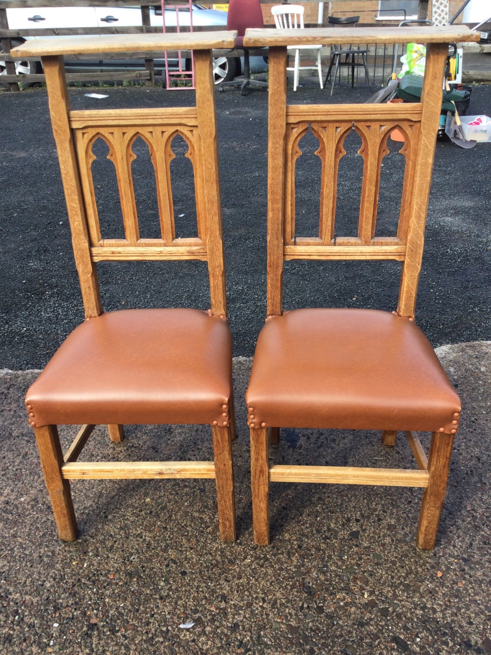 A pair of high-back oak prie-dieu chairs with chiselled platform back rails above gothic fretwork - Image 2 of 3