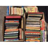 A quantity of childrens books and comics including annuals, classics, Giles cartoon books, Asterix