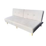 A rectangular linen upholstered sofa bed, with cushion button back folding to form a platform