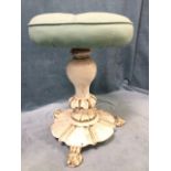 A white & gold painted Victorian rise-and-fall stool with circular button upholstered cushion seat