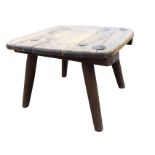 A rectangular rounded wartime stool dated 1935, on angled turned legs - reputedly from a Nazi prison