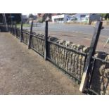 A quantity of wrought iron garden railings in hooped rectangular panels complete with square metal