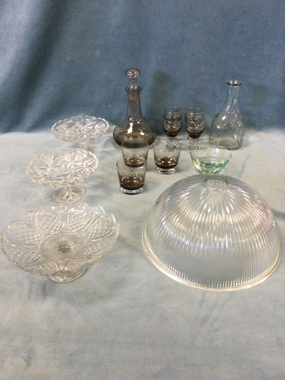 Miscellaneous glass including a fluted lampshade, a smoked glass decanter & glasses set, a pair of