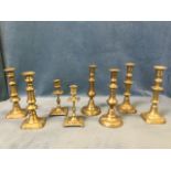 Four pair of brass candlesticks - Victorian baluster with rectangular bases, leaf cast by