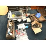 A quantity of DIY tools and materials including a compound mitre saw on stand, rimlocks and other