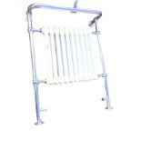 A floor-standing Heritage cast iron radiator towel rail, the painted grill radiator framed by