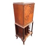 A Warings mahogany secretaire cabinet with moulded top above a drop-down boxwood & ebony chequered