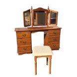 A reproduction pine dressing table, the pedestal mirror with pair of hinged wings on a rectangular