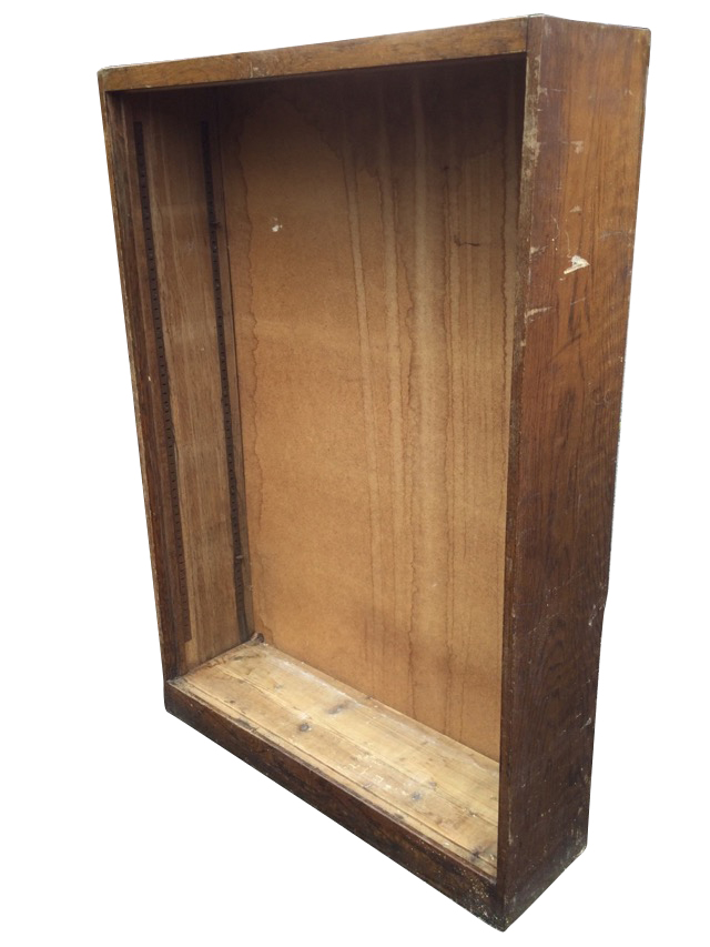 An oak open bookcase, formerly having adjustable shelves. (37.75in x 11in x 54in)