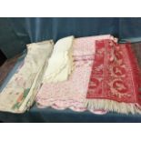 An old linen & cotton floral patchwork quilt; a scalloped pink floral bed cover; an embossed white