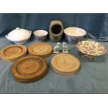 A set of four circular chisel carved hardwood moulds; and miscellaneous ceramics including country