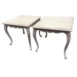 A pair of square painted mahogany occasional tables with moulded tops on foliate carved scalloped