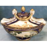 A large oval Meissen style bowl and cover moulded with ribbons and scrolled mounts joined by gilt