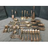 An extensive silver plated set of Queens pattern cutlery with shell embossed handles, basically 18