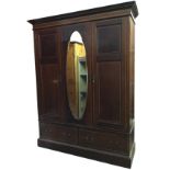 An Edwardian mahogany wardrobe inlaid with satinwood banding, with moulded cornice and plain