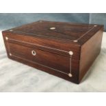 A Victorian rosewood box inlaid with mother-of-pearl medallions and pewter stringing, the interior