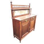 A late Victorian mahogany chiffonier with rectangular bevelled mirror to back beneath a shelf