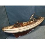 A large twin-masted model boat with weighted keel and wide hull, with fine detail to decking and