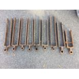 Nine miscellaneous hand-forged wrought iron gate hinges. (9)