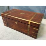 A large regency rosewood writing box with brass military style mounts and handles, the interior with