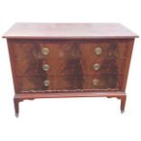 An Edwardian mahogany chest of drawers having rectangular top with channelled edge above three