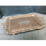 A large heavy Victorian silver plated tray with vine embossed rim and oval handles framing a pierced