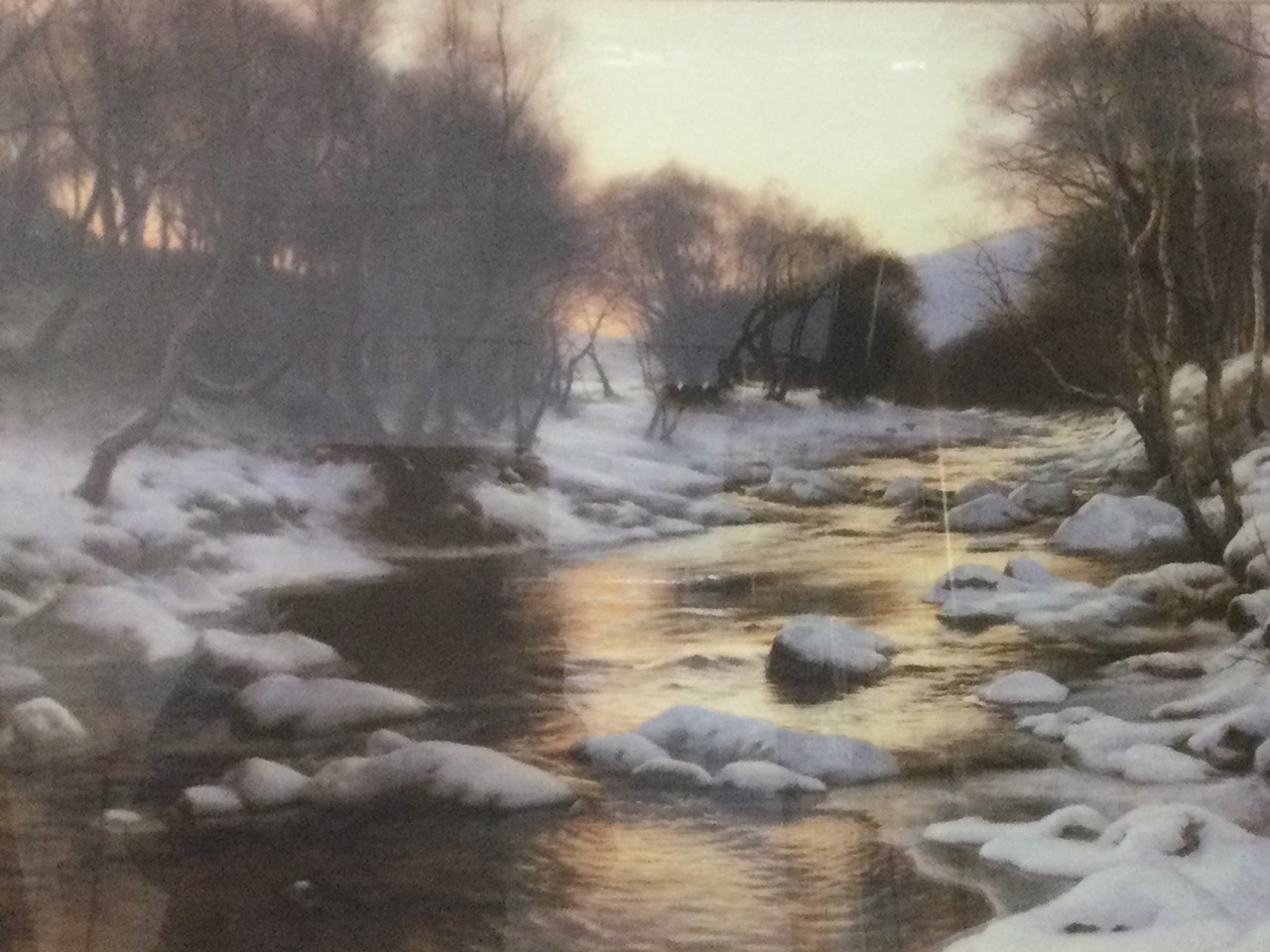 A large Joseph Farquharson print, winter river landscape, labelled to verso And Winters Breath