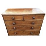 A nineteenth century mahogany chest of drawers with rectangular moulded top above two short and