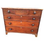 A nineteenth century mahogany chest of drawers with three frieze drawers above three long cockbeaded