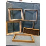 Four miscellaneous picture frames; and a Napa Valley storage rack with compartments. (5)
