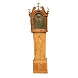 A nineteenth century longcase clock with brass dial by William Davison of London having roman
