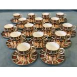 A Royal Crown Derby 16-piece coffee set decorated in the traditional Imari blue, brick-red and