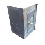 A Victorian cast iron safe by J&H Brookes of Birmingham with brass mounts and handle, the interior