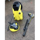 A Karcher K4 premium full control electric pressure washer with various attachments - looks unused.