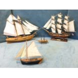 Four miscellaneous handmade wood model boats. (4)