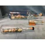 A large model ship in a bottle, the Bells bottle containing scene with four masted sailing ship,