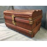 A Victorian 2ft scumbled tin trunk with ribbed and studded hinged lid, having brass mounts and lock,