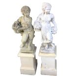 A pair of composition stone girl & boy statues, emblematic of summer and autumn seasons, the figures