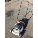 A Flymo rotary garden mower with Briggs & Stratton Quicksilver petrol engine - A/F.