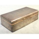 A rectangular hallmarked silver cigarette box with cedar lining and engine turned decoration - SJ