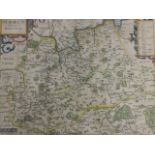 An eighteenth century handcoloured map of Surrey, the plate with fold line after Johanes Norden