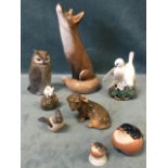 A large Royal Copenhagen porcelain model of a fox looking at the stars; and seven other Royal