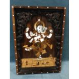 An eastern hardwood marquetry panel inlaid with a dancing elephant style figure enhanced with