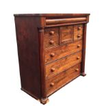 A Victorian mahogany Scotch chest with long column drawer above a central panelled hat drawer