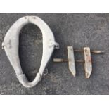 A galvanised metal horse collar; and an old wood carpenters clamp. (2)