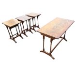 A set of three crossbanded mahogany coffee tables with ribbed edges to rectangular tops, supported