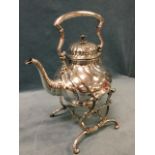 A large early Victorian silver plated tea kettle on stand, the gadroon moulded vessel with swing