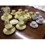 A Carlton Ware six-piece teaset moulded and decorated in the Australia floral pattern, including